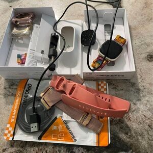 FitBit Versa 3 with many extra accessories